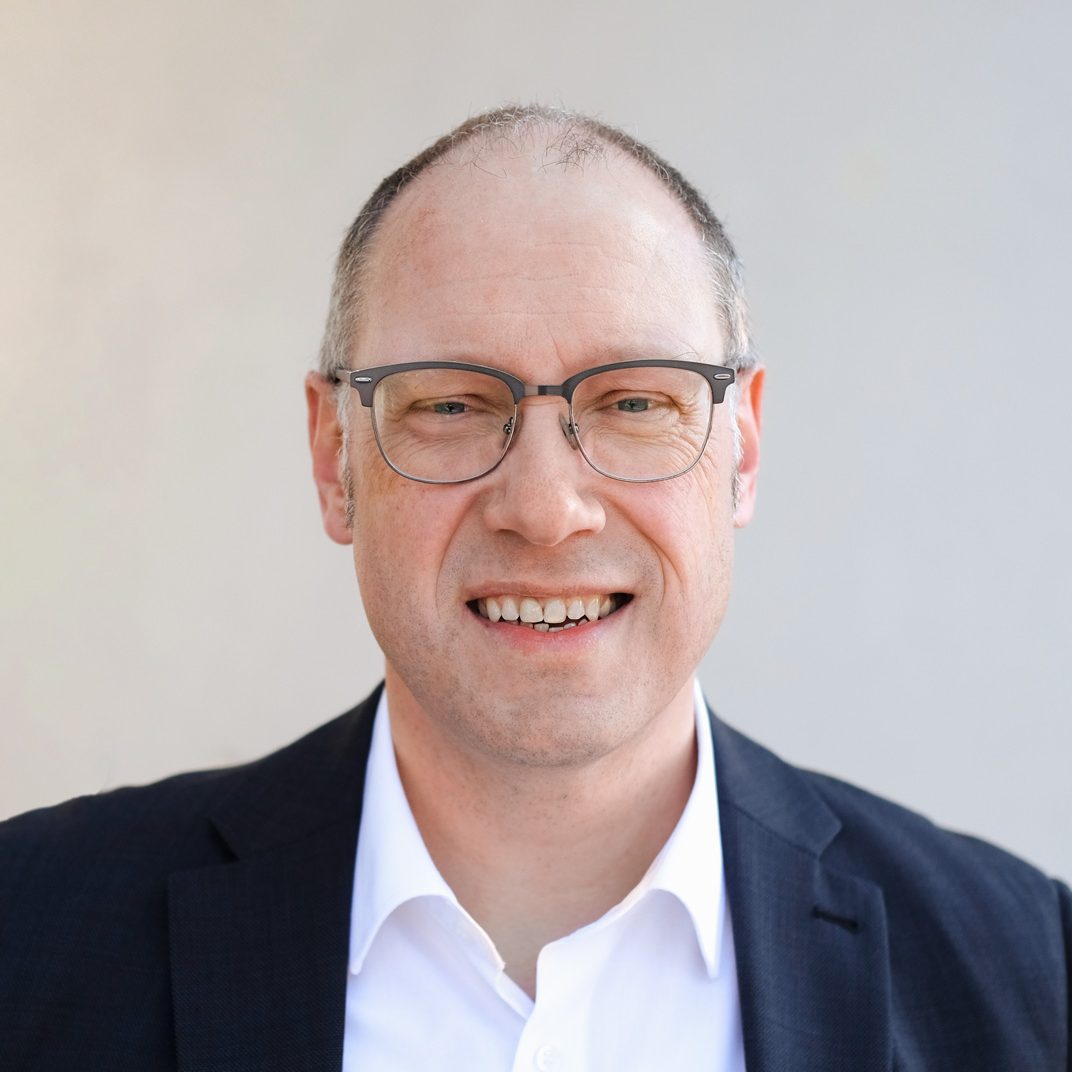 Portraitbild eines Mitarbeiters